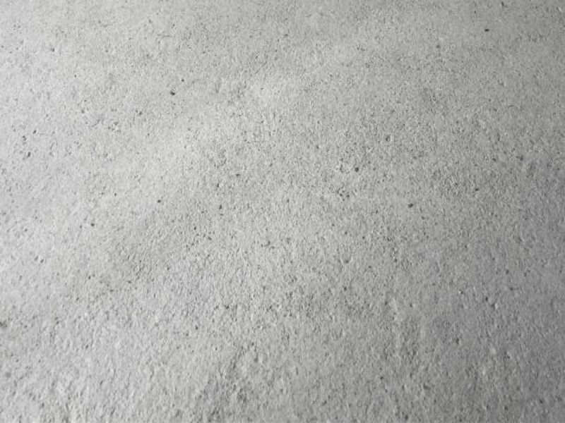 Broadcasting Sand Into Concrete